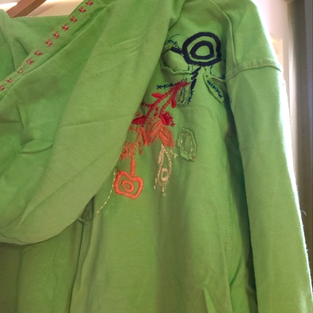 2 piece embroidered knit pants and jacket with ruishing.